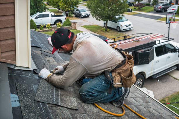 Professional Roofing technician working in Carver, MA